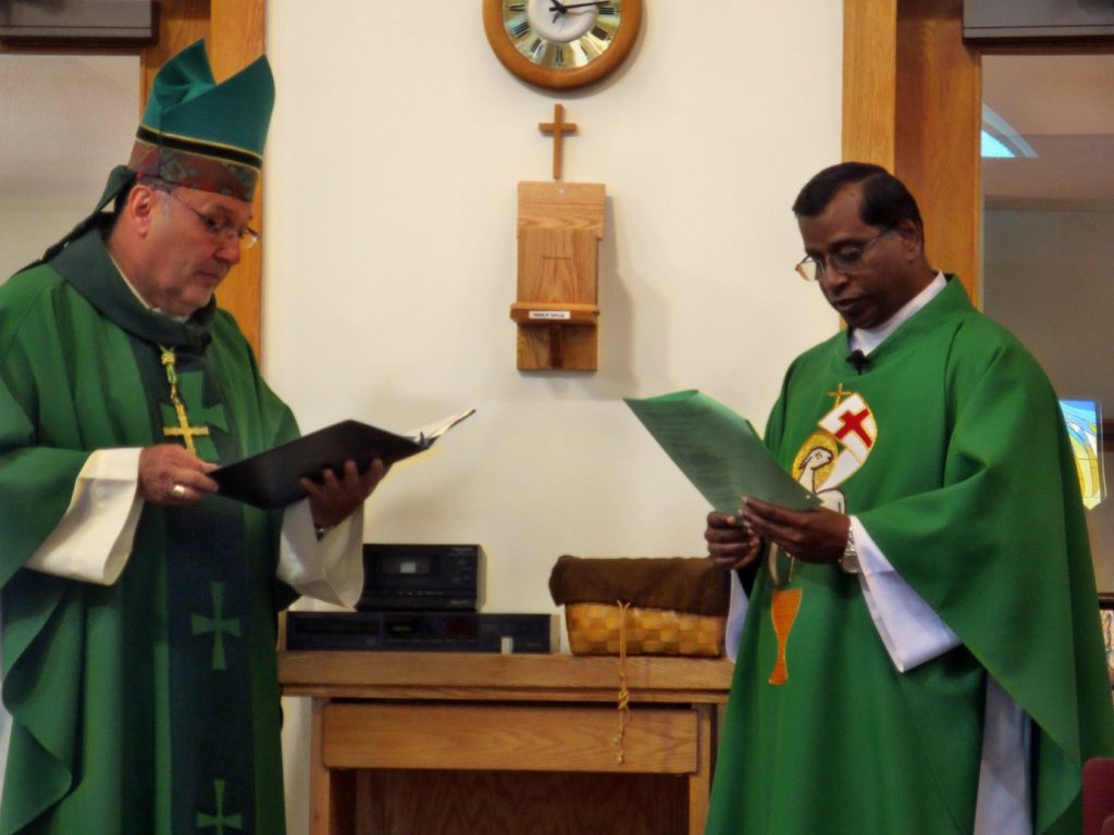 At the Ambry where the Holy Oils are reserved for the strengthening of God's Faithful People.