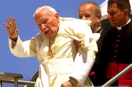 Pope John Paul II  disembarking an airplane in Toronto